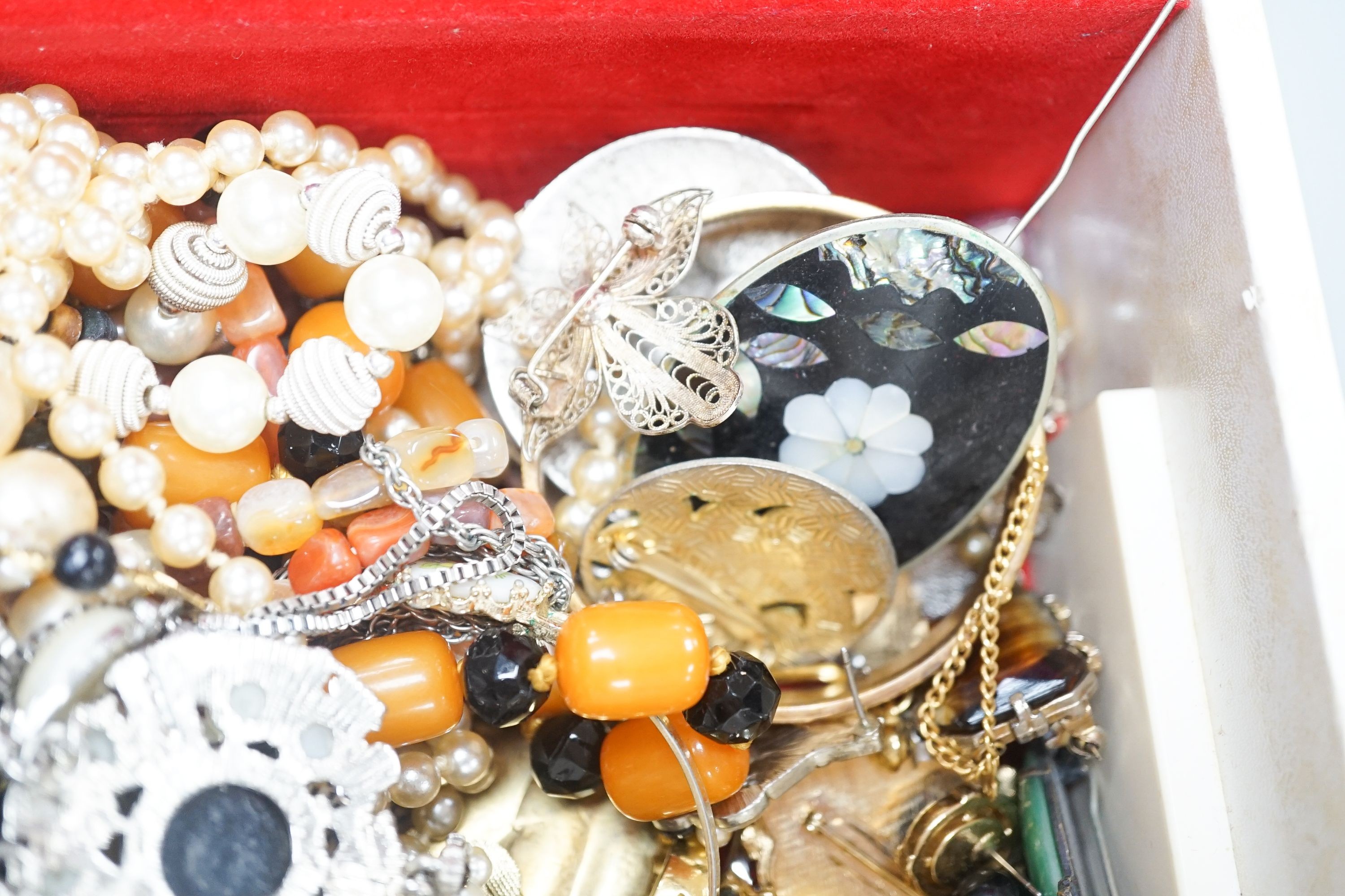 A quantity of mixed costume jewellery, including necklaces, rings etc.